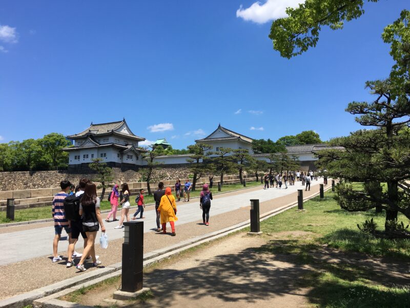 People entering Osaka Castle in Osaka, Japan